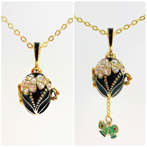 Black pendant with a surprise butterfly