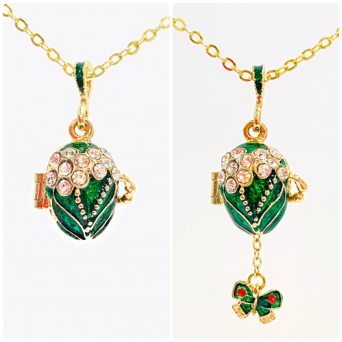 Green pendant with a surprise butterfly